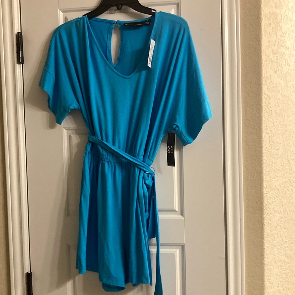 Romper small. Teal in color
